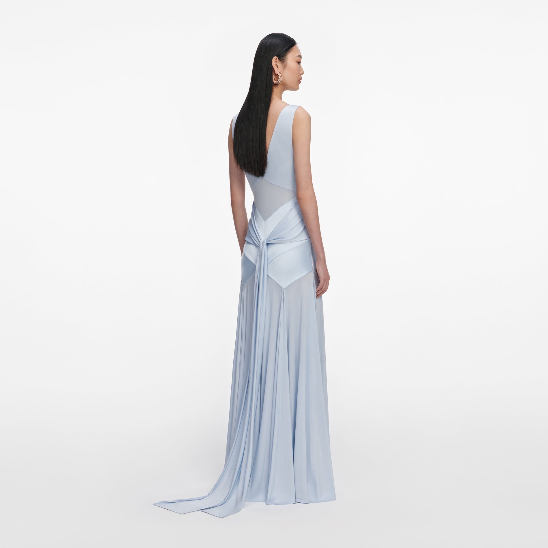Back view of a woman wearing the Blue Satin Jersey Maxi Dress