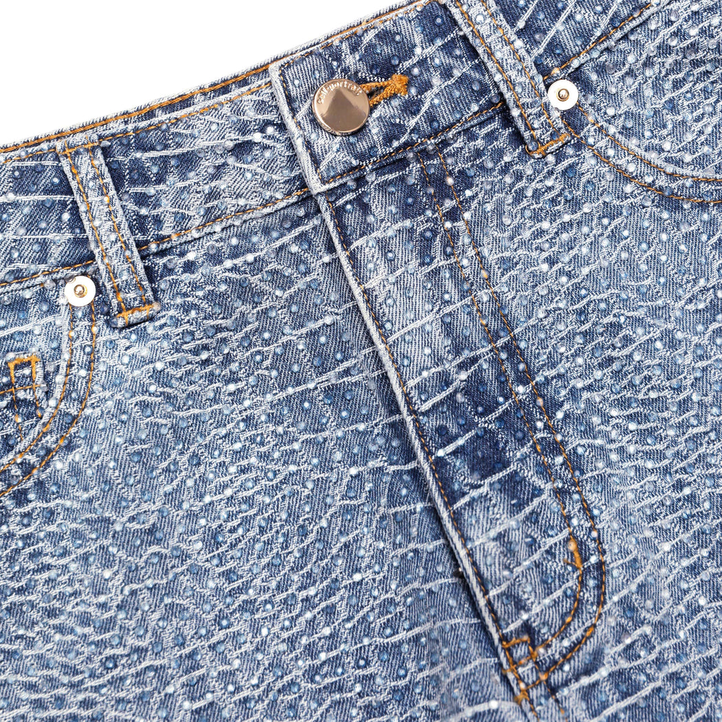 A close up of the fabric for the Rhinestone Croc Effect Denim Shorts