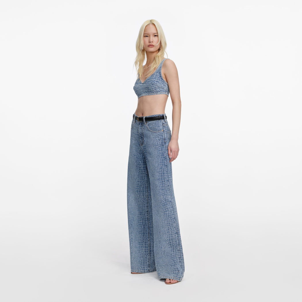 Side view of a woman wearing the Rhinestone Croc Effect Denim Bralette
