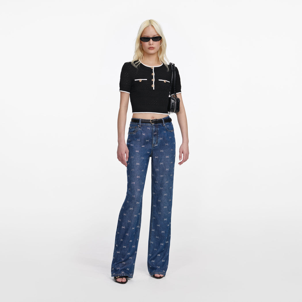 Front view of a woman wearing the Lightweight Bow Embellished Jeans