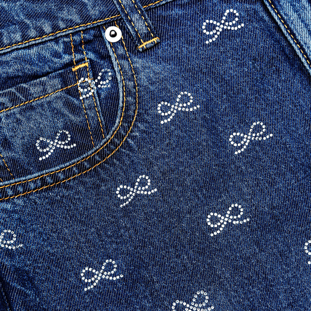 A close up of the fabric for the Lightweight Bow Embellished Jeans