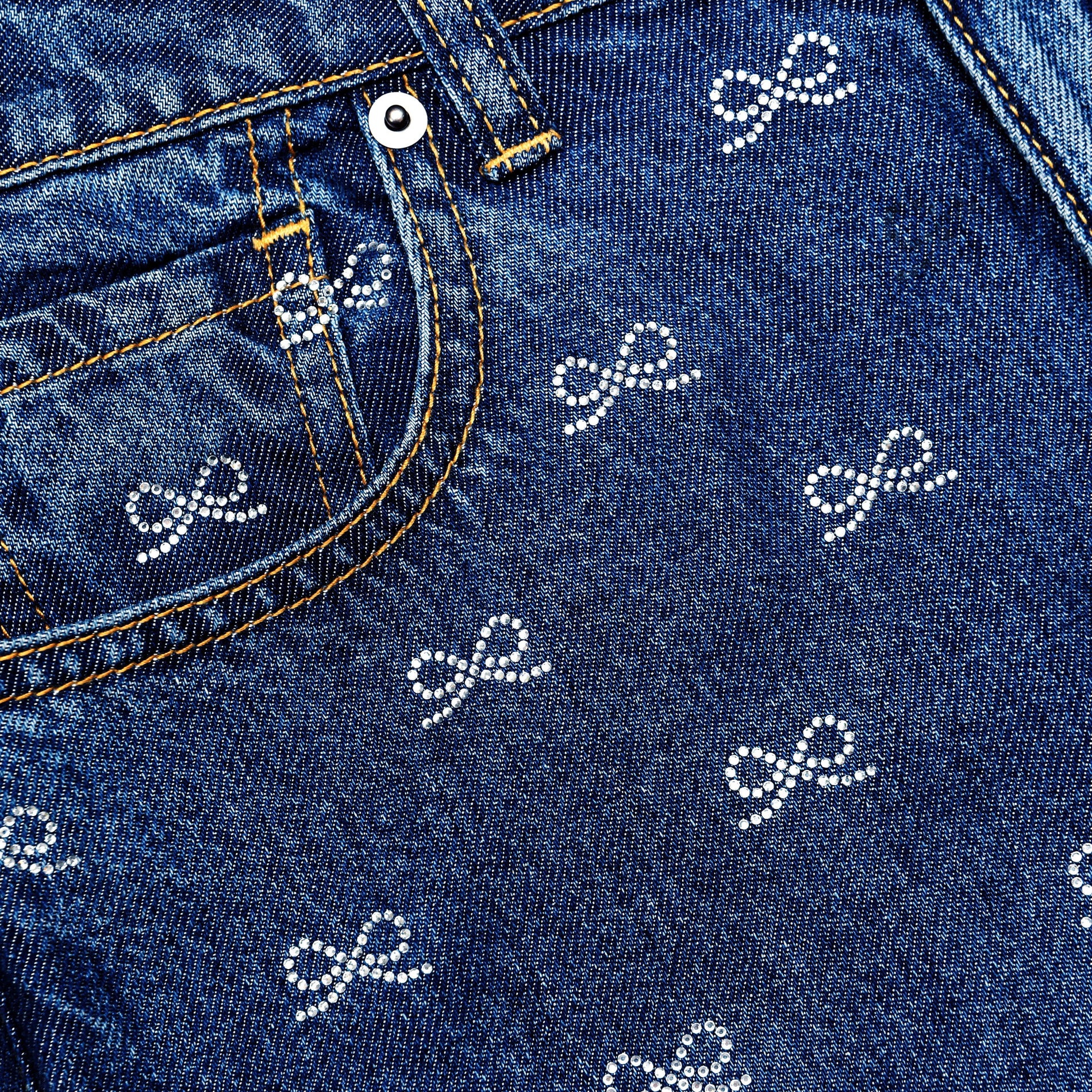 A close up of the fabric for the Lightweight Bow Embellished Jeans
