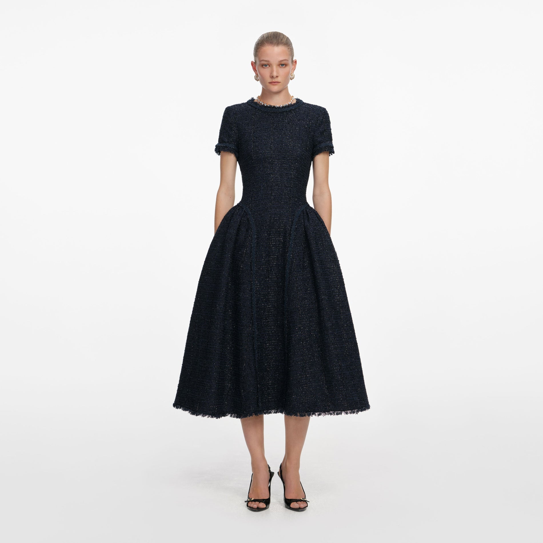 Front view of a woman wearing the Navy Metallic Boucle Midi Dress