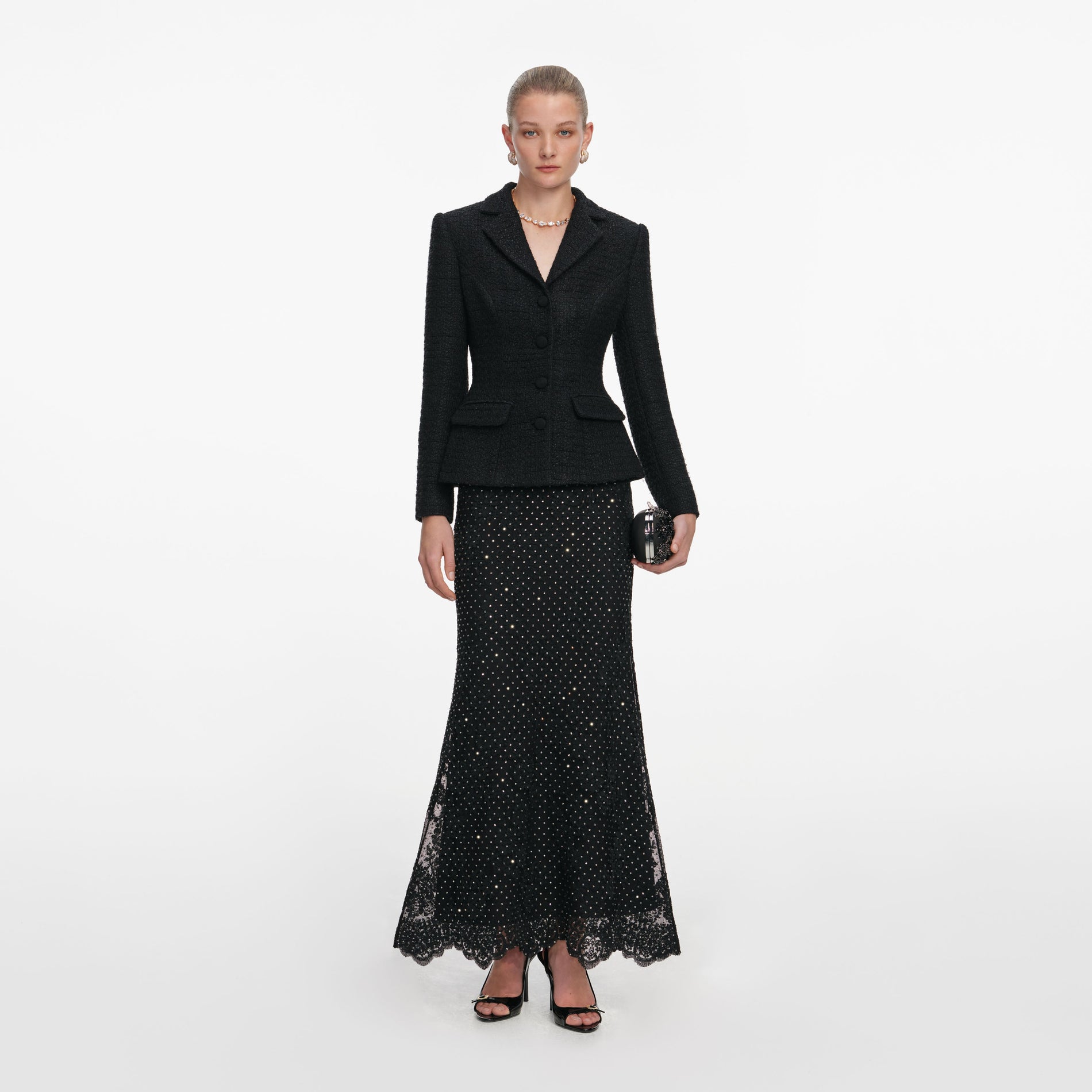 Front view of a woman wearing the Black Boucle Rhinestone Lace Maxi Dress