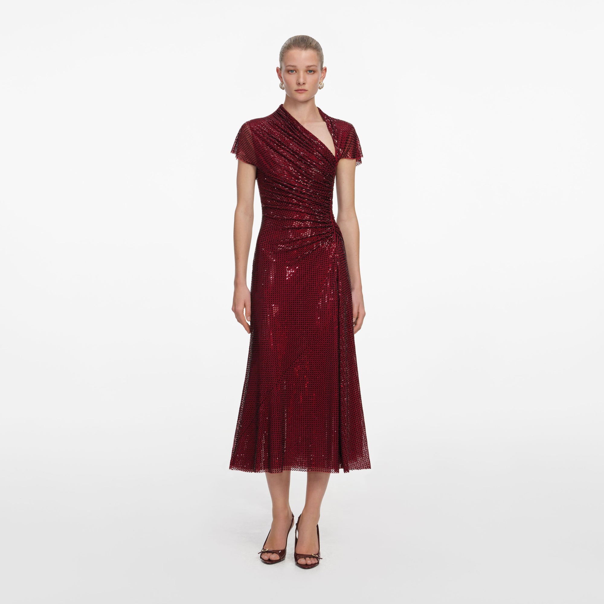 Front view of a woman wearing the Red Rhinestone Drape Midi Dress