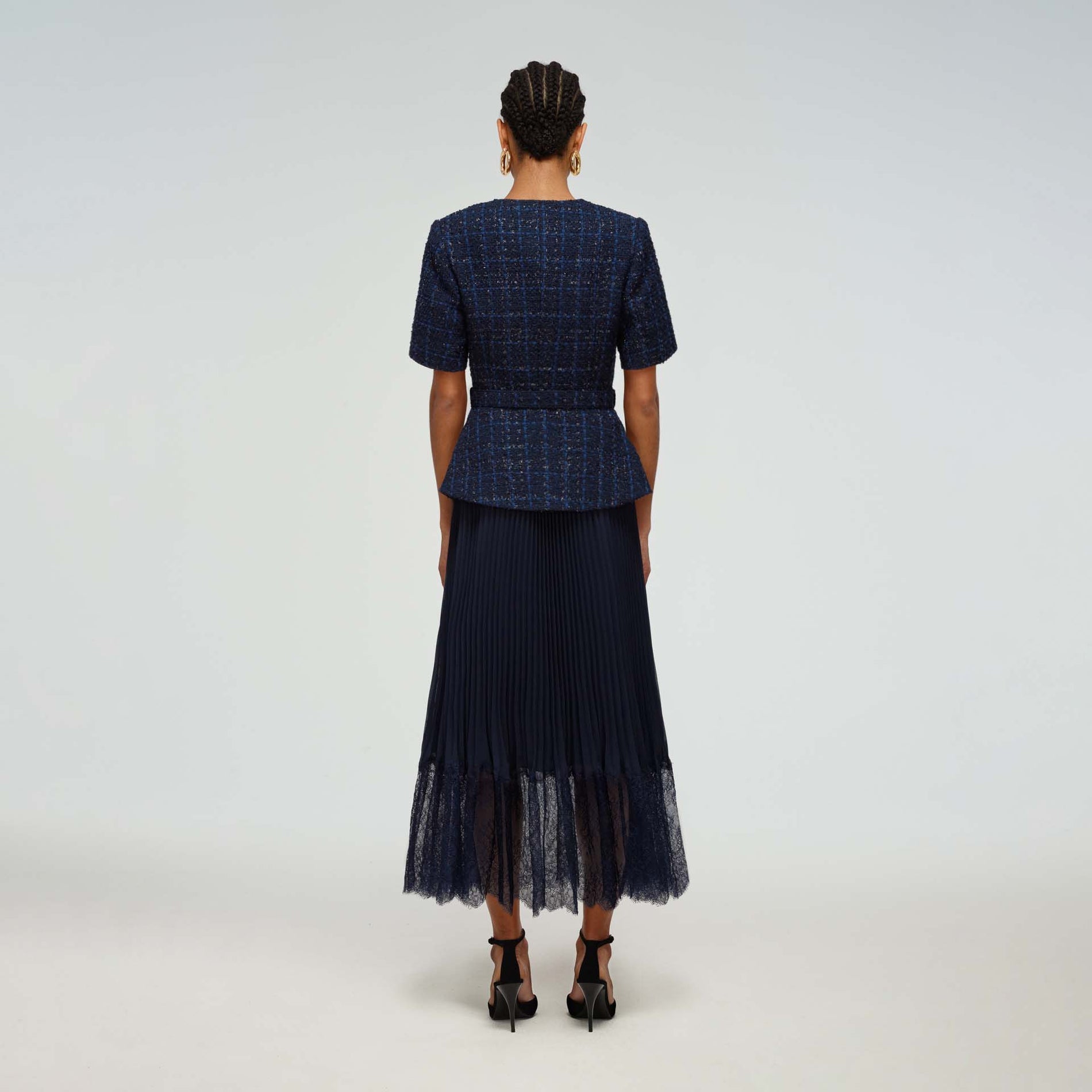 A woman wearing the Navy Metallic Bouclé Tailored Midi Dress