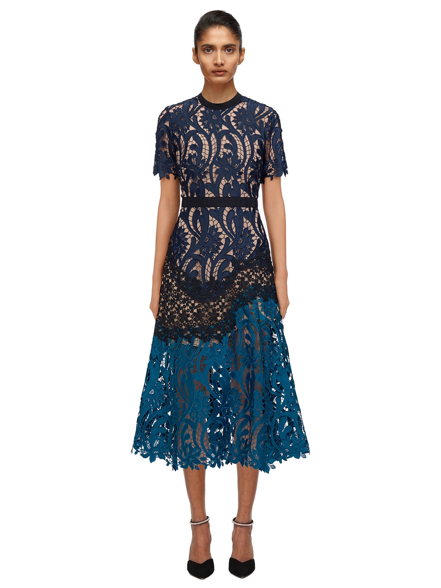 Front view of a woman wearing the Prairie Midi Dress