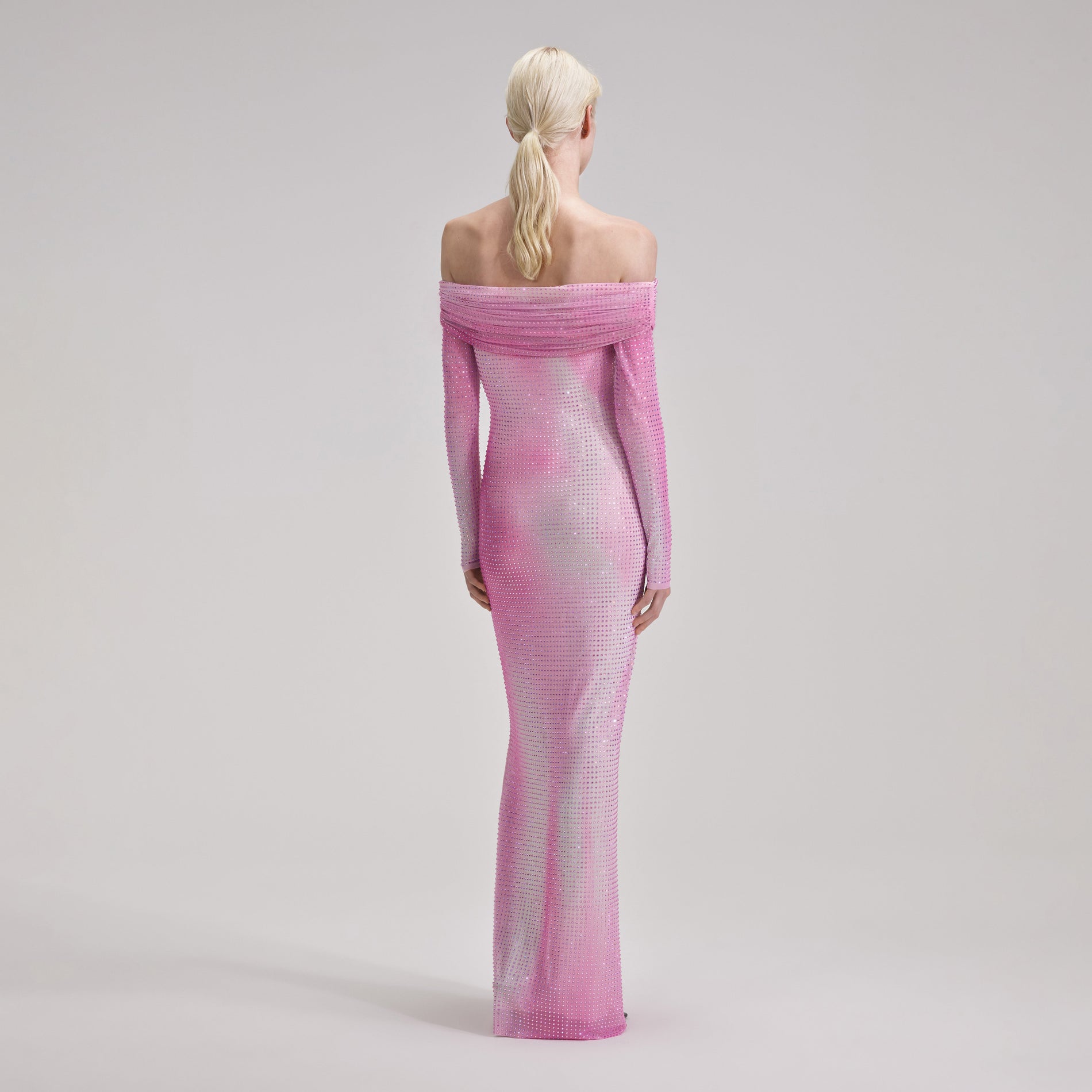 A woman wearing the Pink Contour Print Maxi Dress